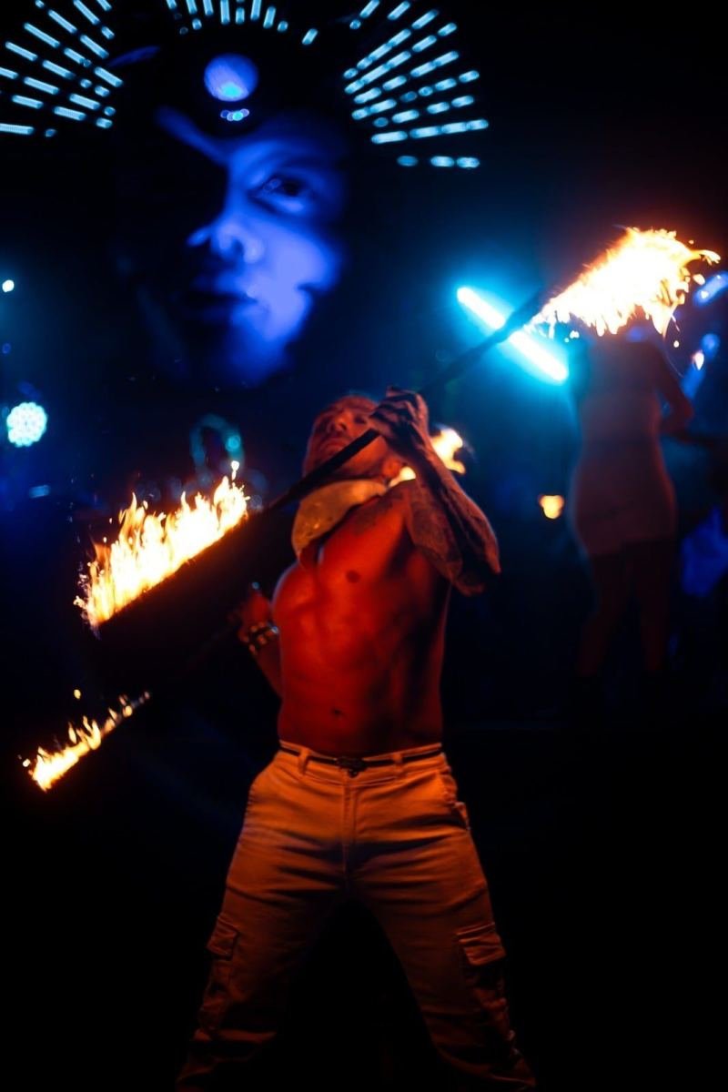 Fire dancer performing at night