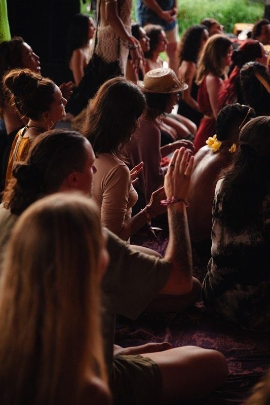 Circle of people at a ritual